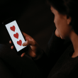 Person messaging on phone unaware of online romance scam